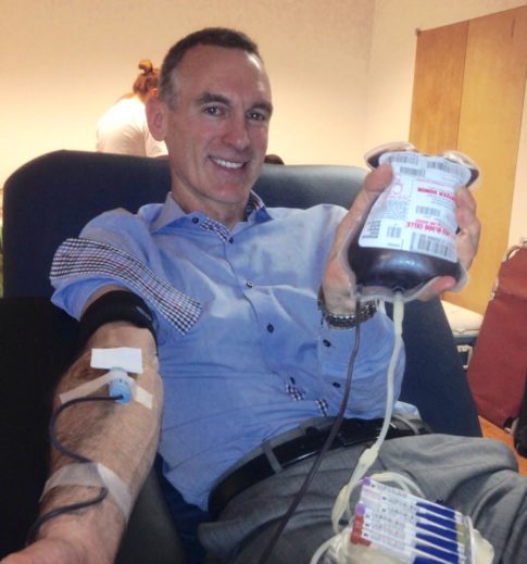 Blood, no sweat or tears: RAND’s Marketing Director Peter Scallion hoists his pumped pint.