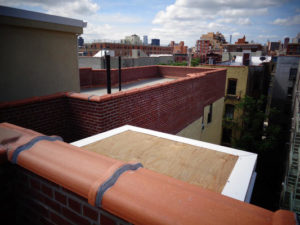 New roof, new parapet walls at 310-312 West 122nd Street