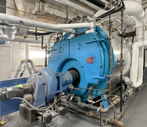 Newly installed dual-fuel burner configured to operate on interruptible gas with No. 2 oil stand-by.