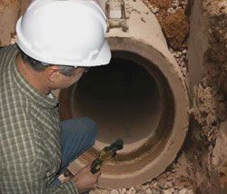 Rand employee inspecting sewer lines