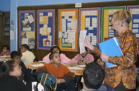 Rand Architect Lynne Funk explains the details of building design to a class of budding preservationists at the Bloomingdale School (P.S. 145).