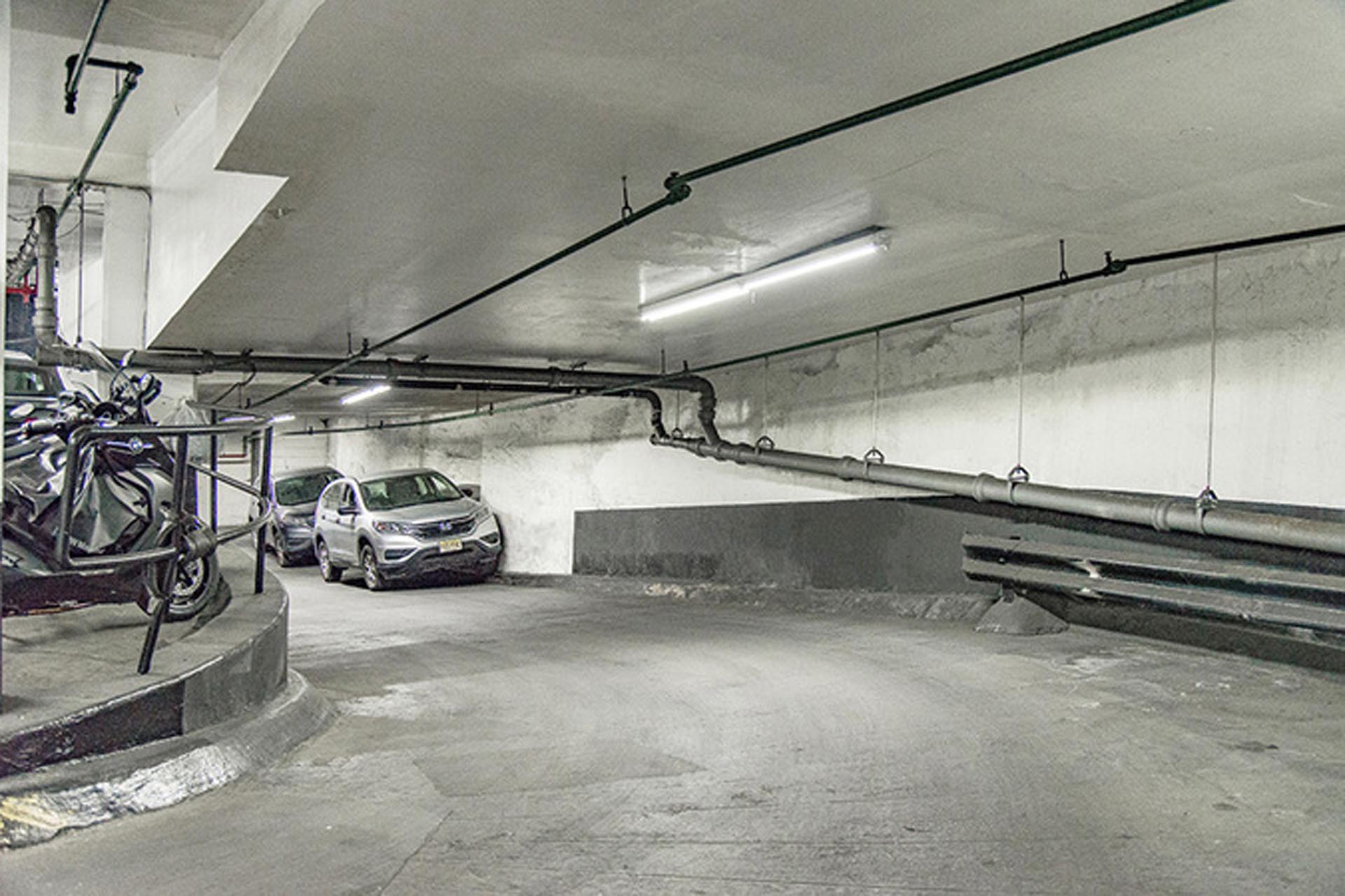 <p>Repairs included floor and ceiling patching with a concrete repair mortar, installation of additional reinforcing where required due to deterioration of the existing and injection/sealing of cracks in the slab, and full-depth slab replacement of a large severely deteriorated area. </p>