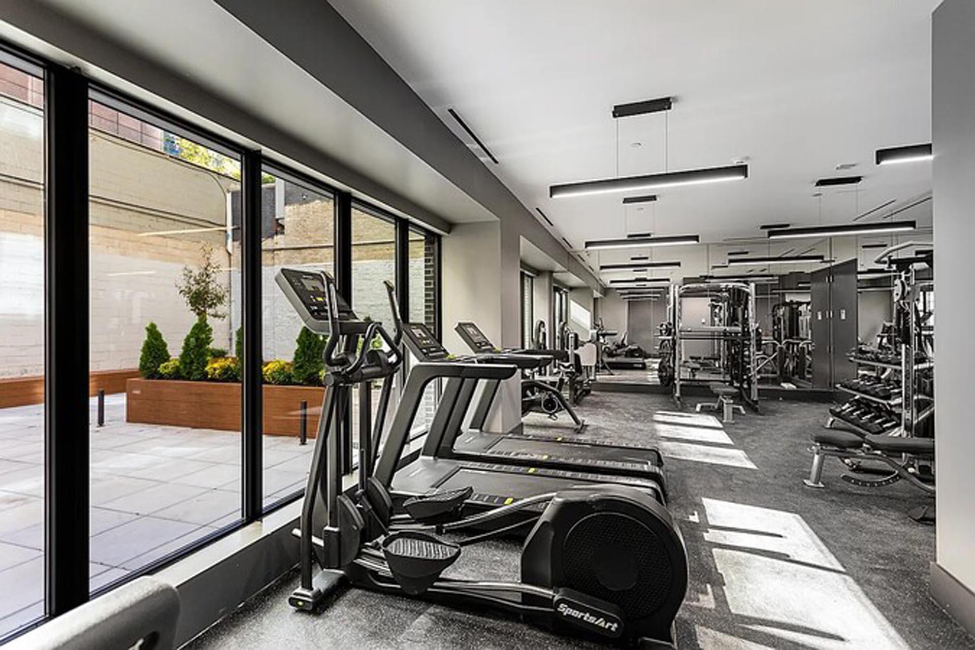 <p>The Residences is a full-service amenities condominium, including a bike room, gym, and private outdoor space.</p>

