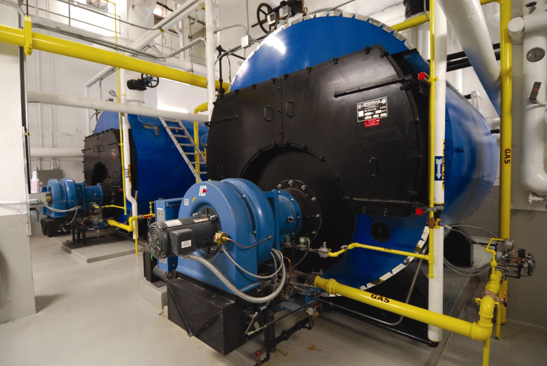 <p>The new 350-horsepower Scotch-marine steel boilers, which replaced the building’s original steam boilers, can run on both oil and gas.</p>
