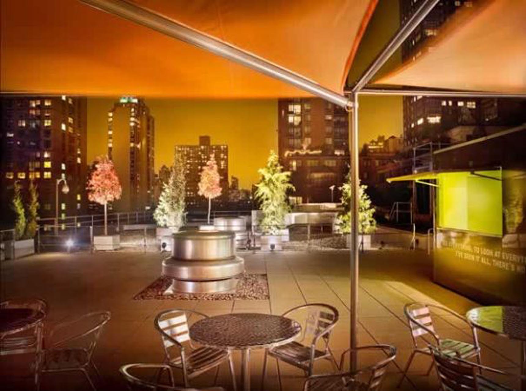 <p>The rooftop terrace features a bar, grills, and retractable canopy.</p>
