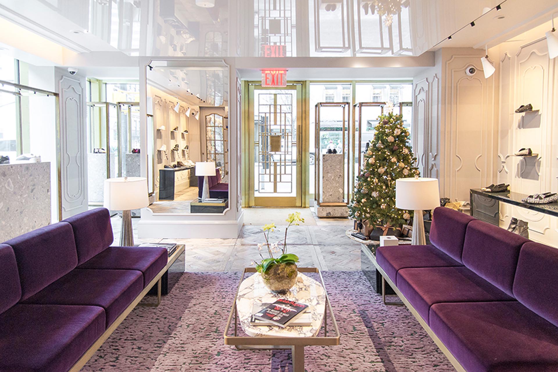 <p>The store features 20th century design elements and heavy lacquer, hammered brass, deep velvet, volcanic stone, and cherry marble accents.</p>
