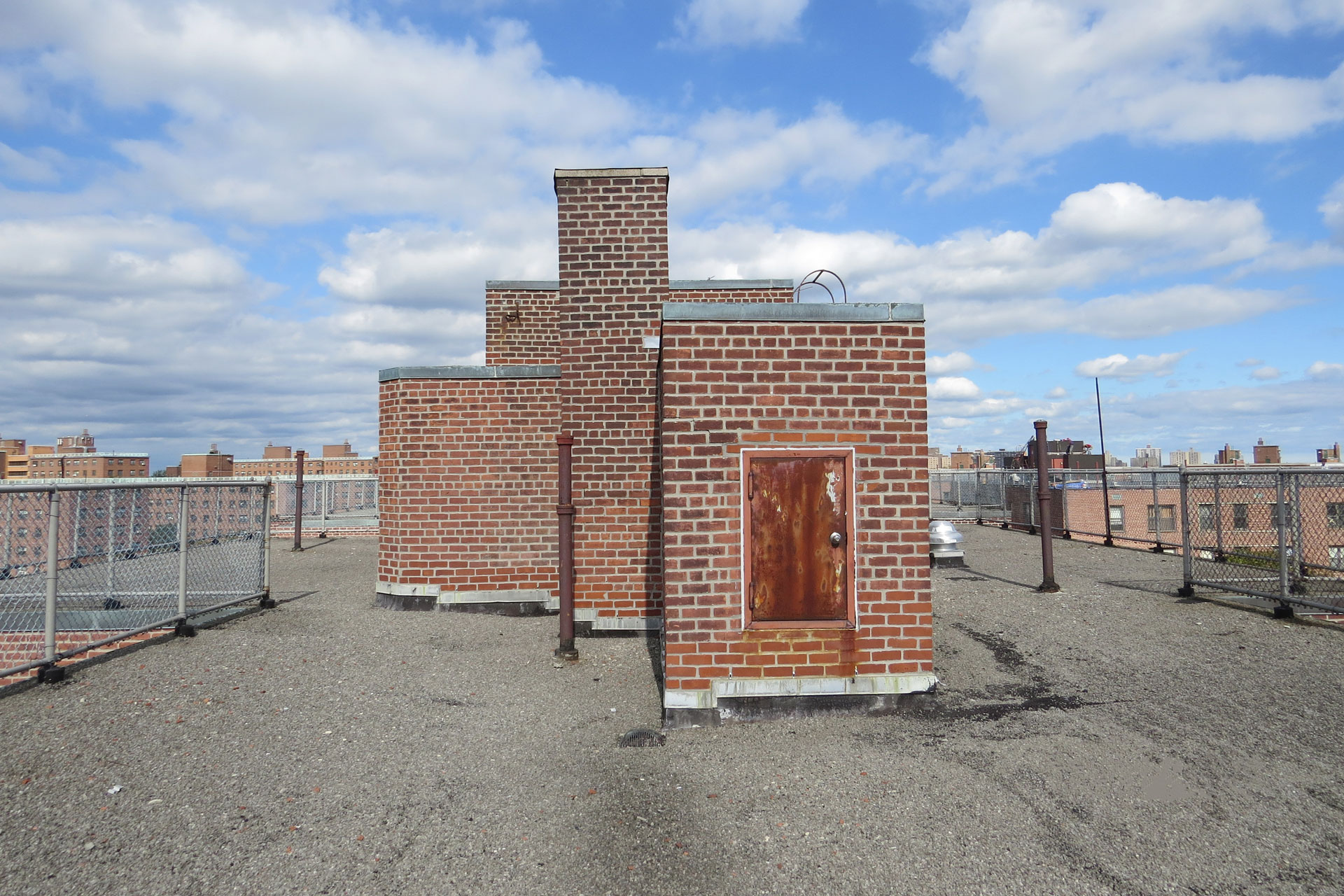 <p>Before photo of the roof and roof bulkhead before roof replacement program. </p>
