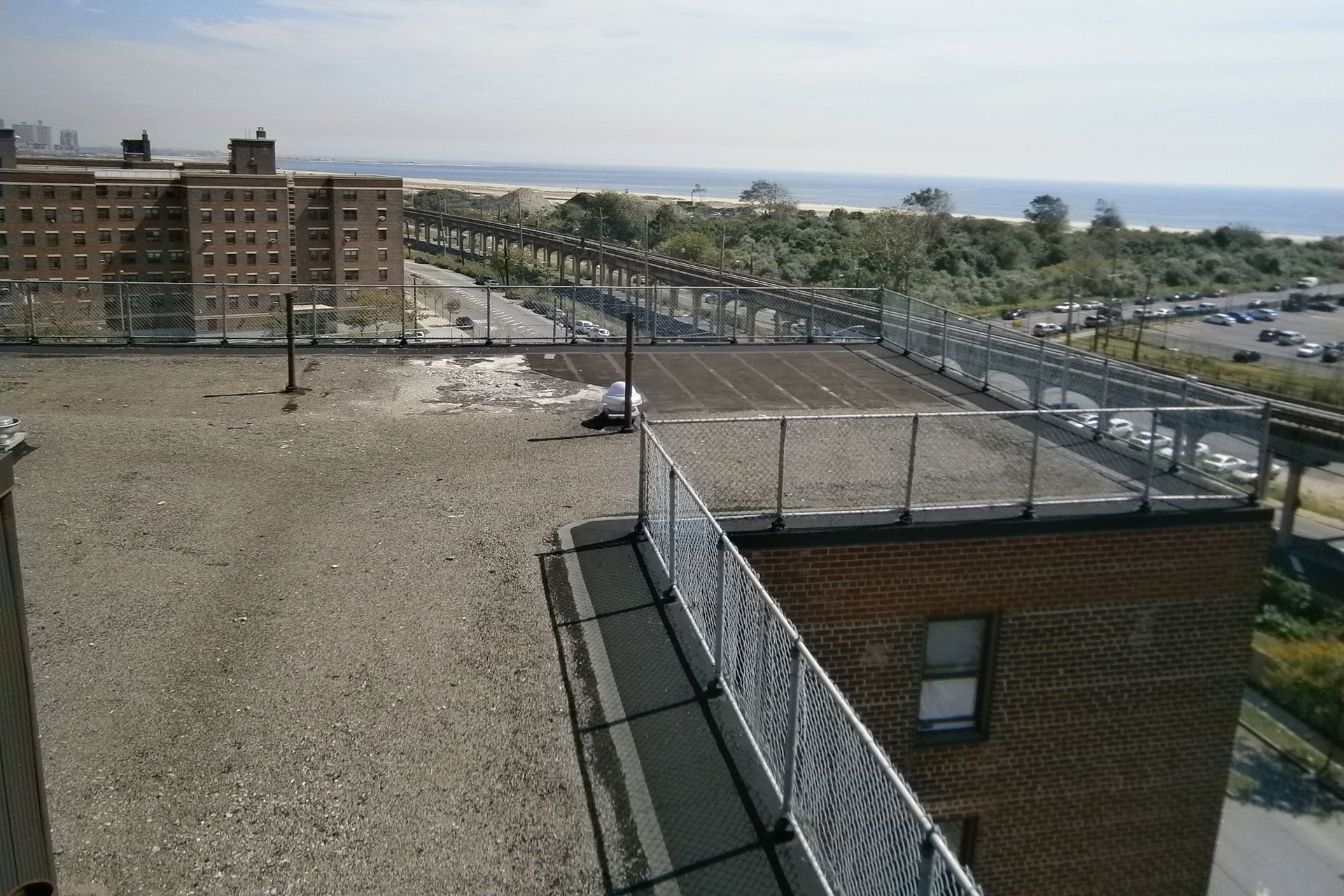 <p>Photo of the roof and roof railings before roof and railing replacement program. </p>
