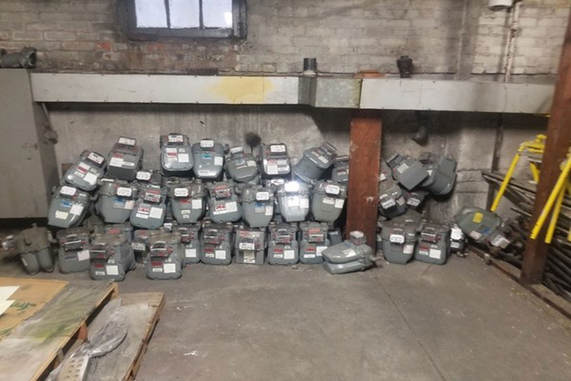 <p>Individual gas meters were removed to convert to a master meter system for each building.</p>
