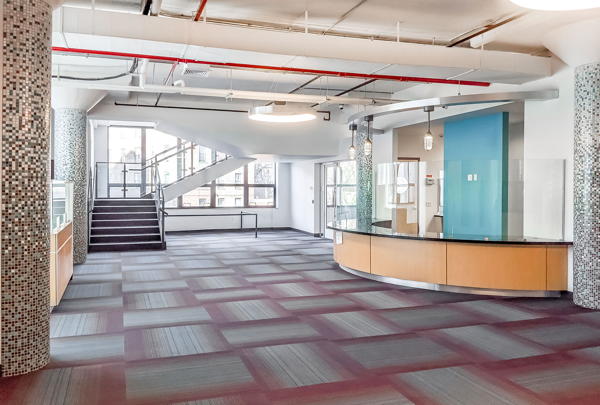 <p>The Floating Hospital flagship clinic’s main lobby/reception area is located on the first floor. Access to the clinic is through an entrance in the two-story building on 21 st Street, leading to an elevator and stair landing on the second floor of the main four-story building.</p>