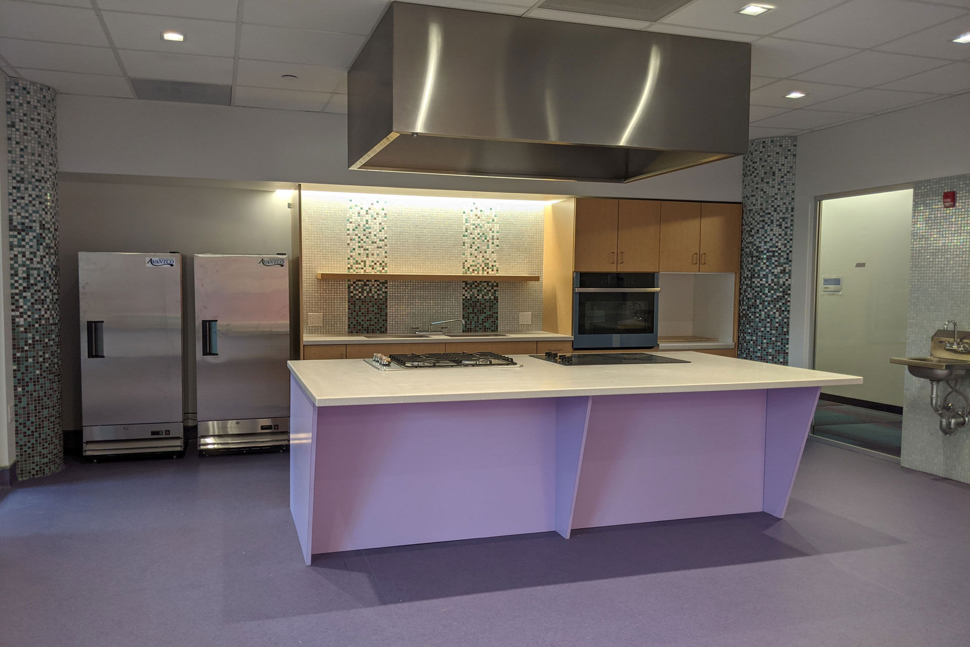 <p>A new teaching kitchen on the first floor serves as the Floating Hospital’s health education centerpiece, offering families an opportunity to learn together about selecting and preparing nutritious meals.</p>