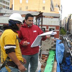 Rand goes over construction plans