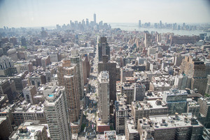 Hands-on Facade Inspection Safety Program (FISP) inspection by motorized scaffold in New York City.