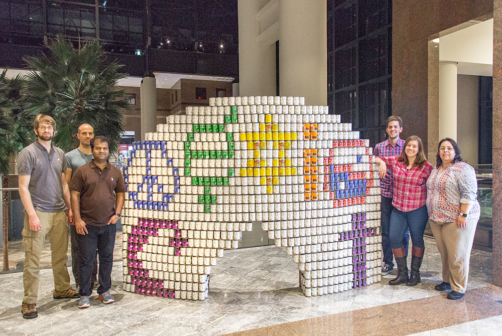 RAND Engineering & Architecture's 2017 Canstruction NY team and sculpture "We CAN Co-Exist"