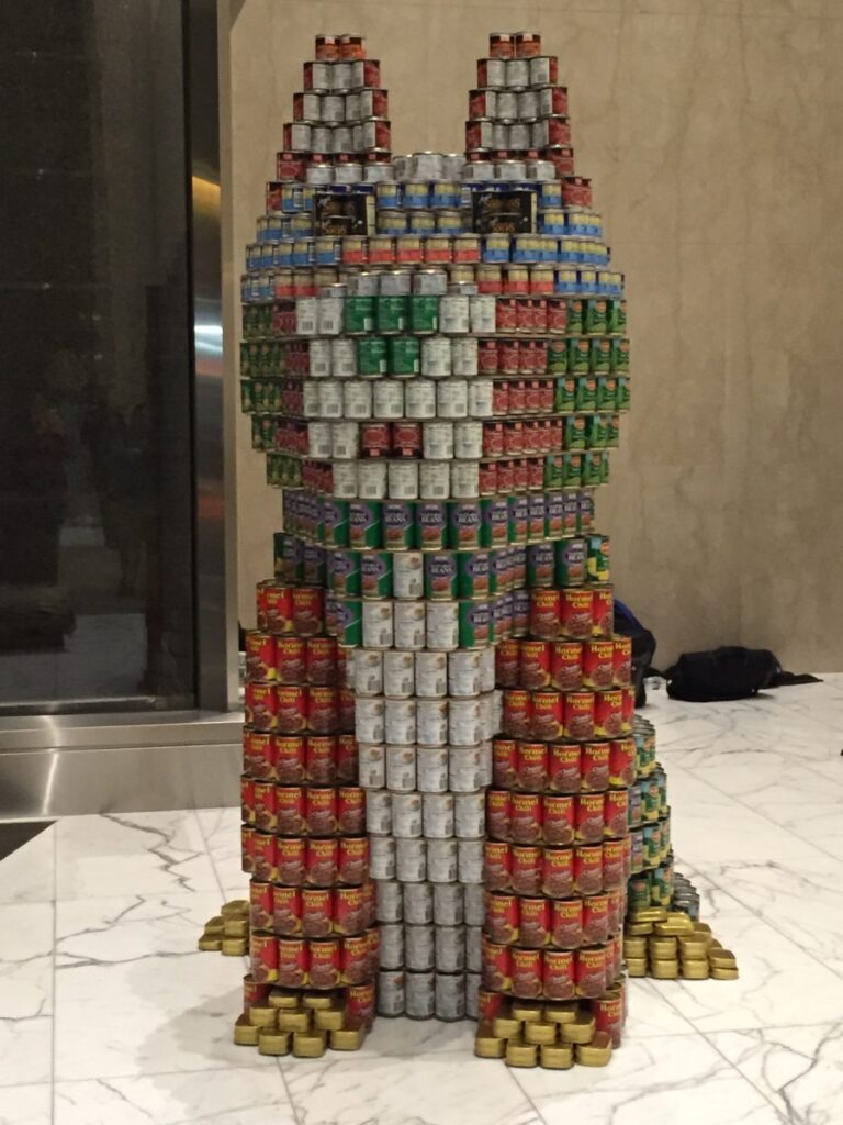 RAND’s Canstruction sculpture “Hounding Hunger,” which was built with 2,568 cans, won the “Best Meal” award.
