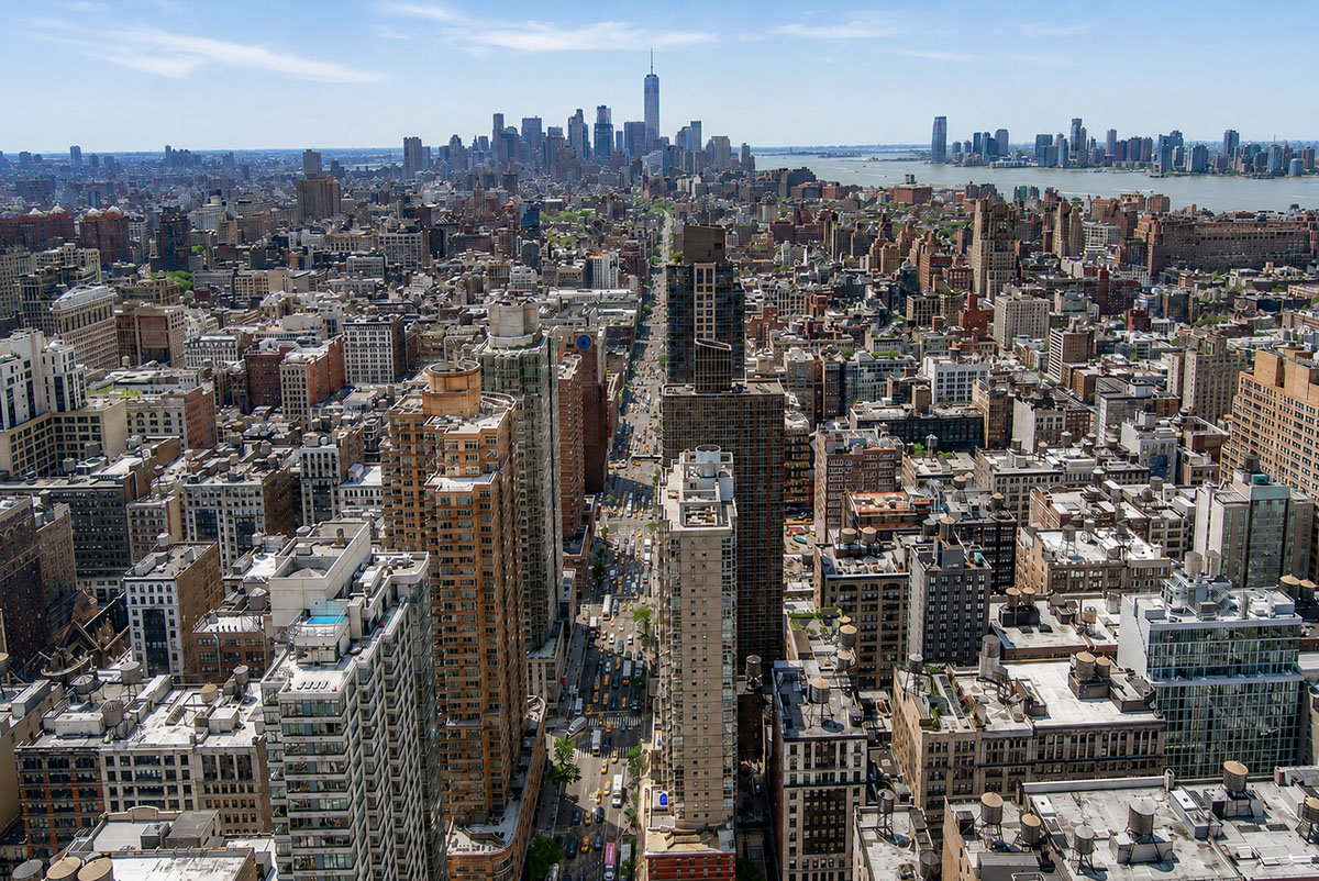 Hands-on Facade Inspection Safety Program (FISP) inspection by motorized scaffold in New York City.