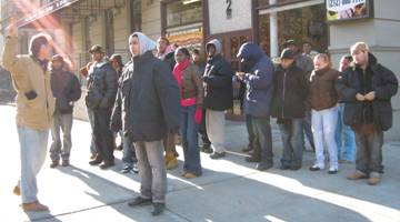 Tom Russack leads a tour of older buildings in Harlem for one of his former classes in masonry preservation.