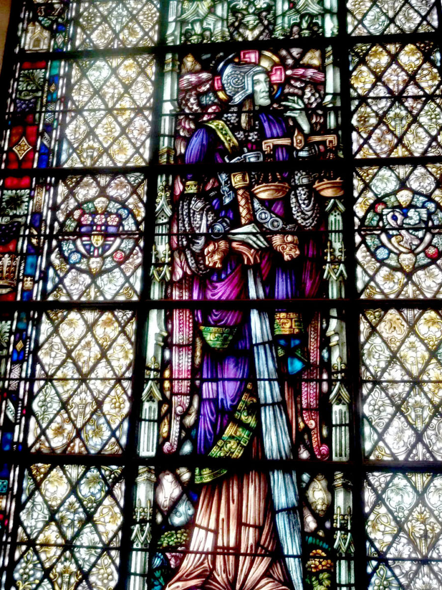 The church's sanctuary features brilliant stained glass windows.