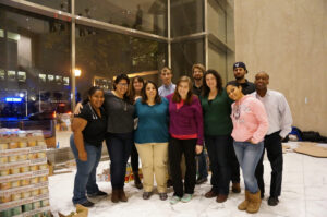 RAND’s Canstruction team enjoys some pre-build bonding.