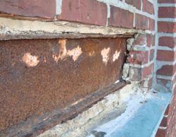 deteriorated steel caused by a missing waterproofing membrane